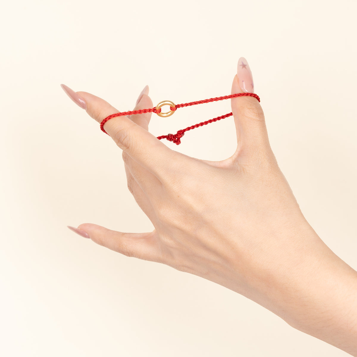 平安扣细红绳编织手链 / Ping An Kou Thin Red String Braided Bracelet — on-hand image 2